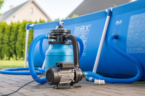 Sand,Filter,System,Next,To,A,Pool,In,Your,Own